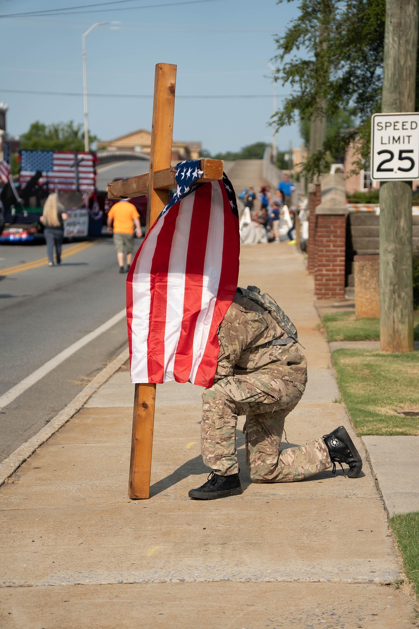 american flag, us flag, soldier, kneeling, sidewalk, american flag, american flag, american flag, american flag, american flag, us flag